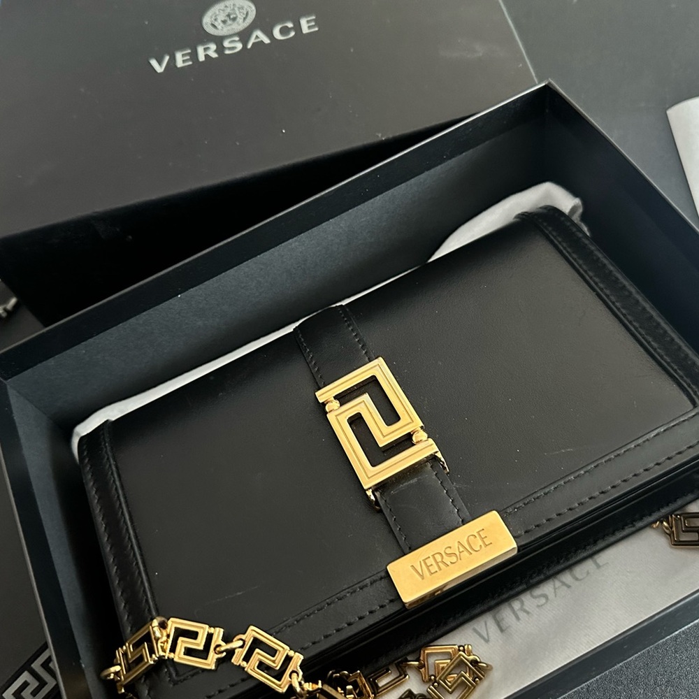 Leather Versace cross body. Great conditions some scratches detailed on pictures